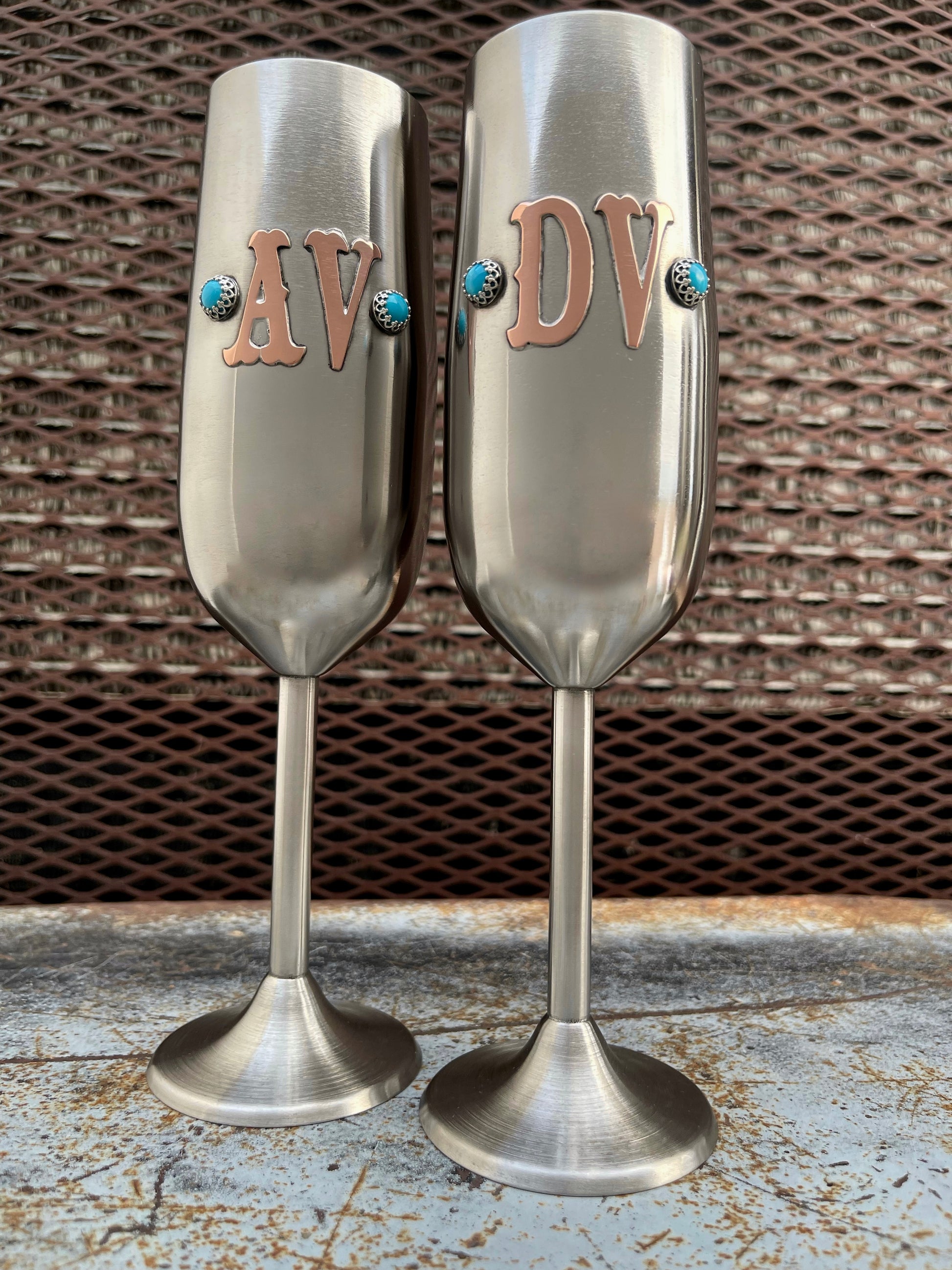 one set of wedding toast glasses with initials and turquoise