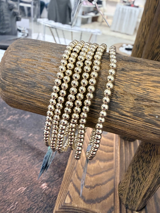 3 mm gold stretch beaded bracelet