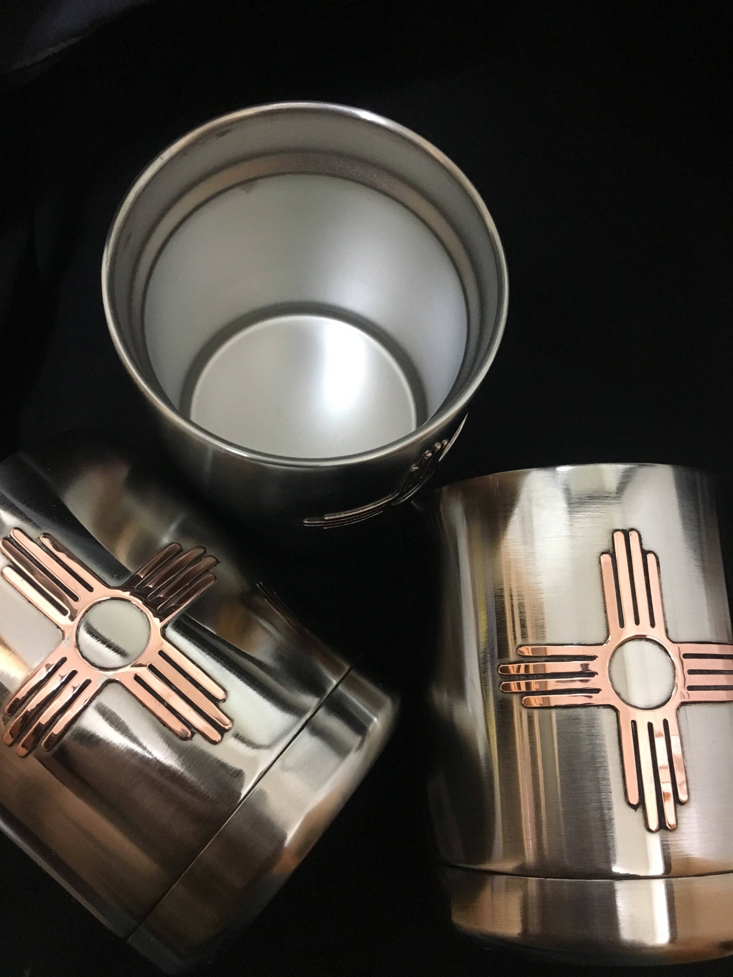 Custom whiskey cup with copper Zia symbol